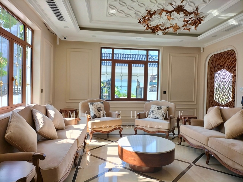 Thi công bàn trà tròn gỗ óc chó mặt đá ngoài làm bàn uống nước đón tiếp khách mà còn trang trí ấn tượng cho không gian